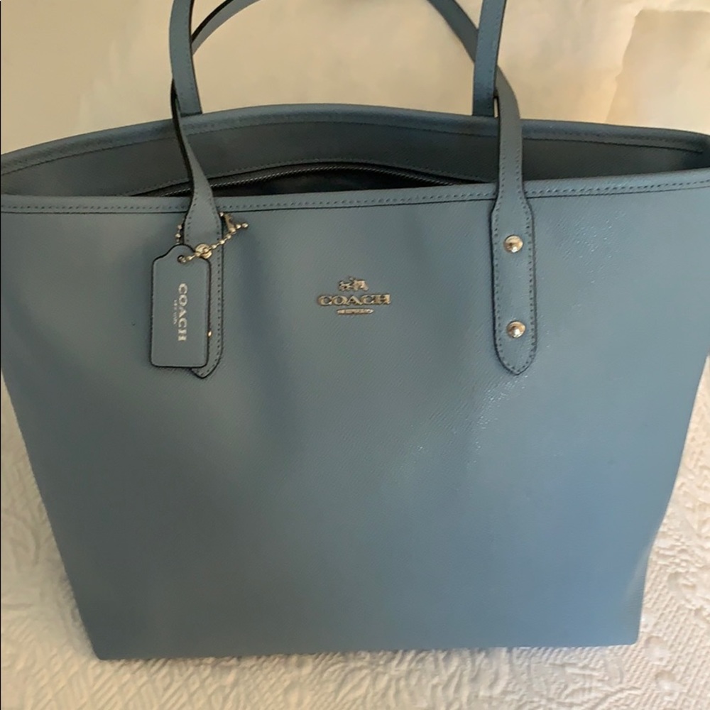 Baby Blue Coach shoulder bag.